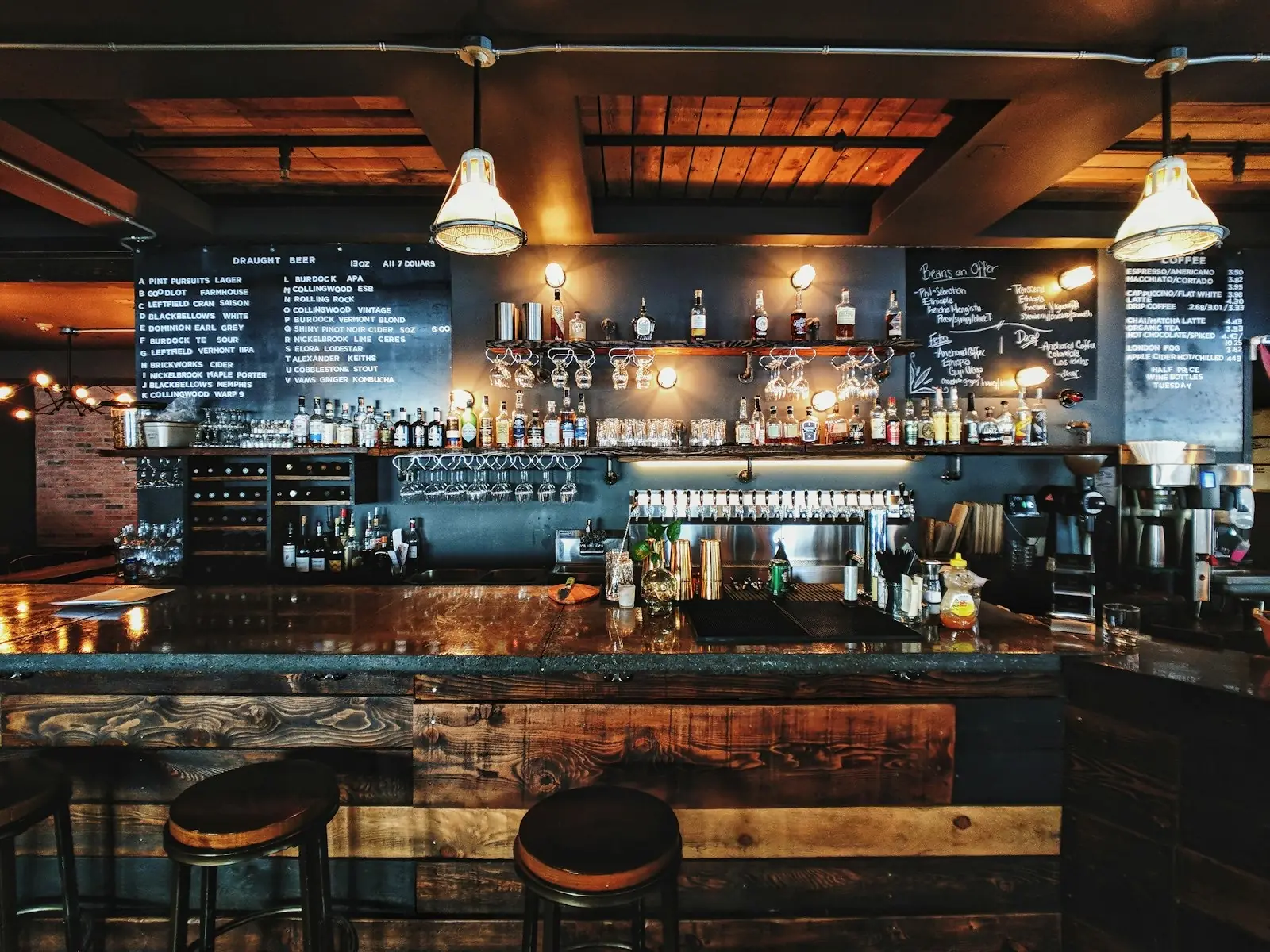 A well-stocked bar with draught taps and chalkboard menus